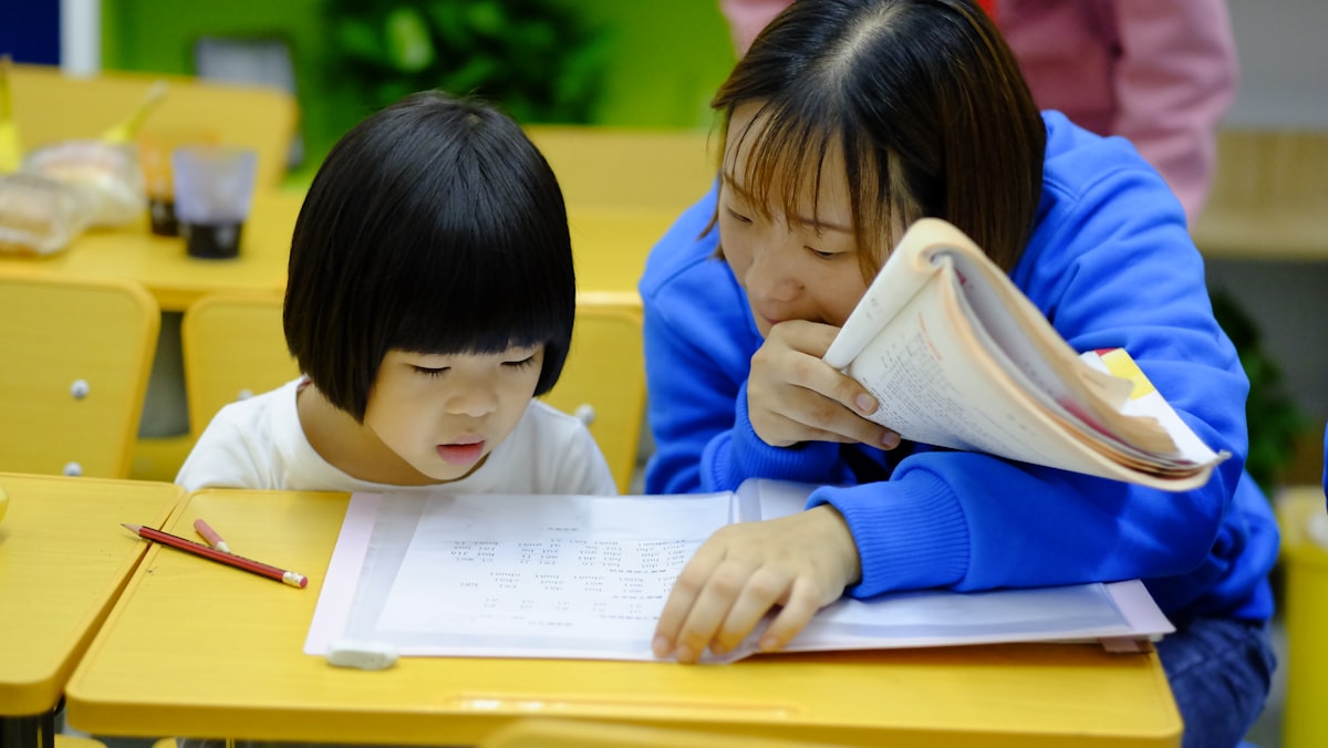 A child reading and thinking while studying at home